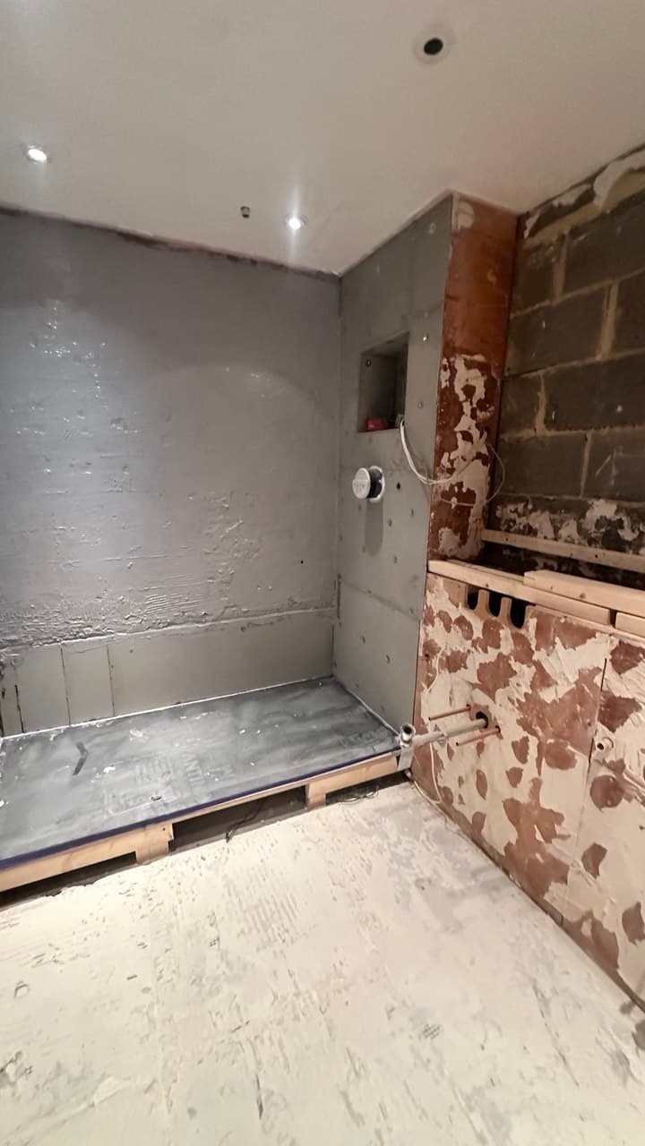 Aqua board and shower tray tanking before finishes are applied